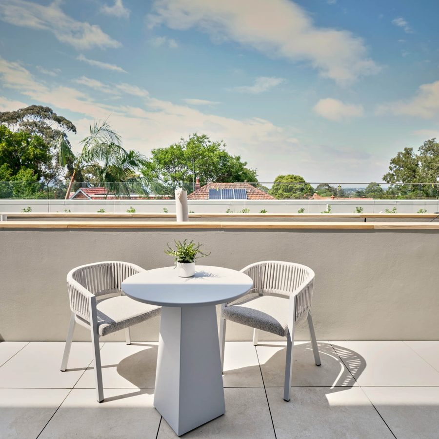 Greenwich Place deluxe room terrace with table and chairs
