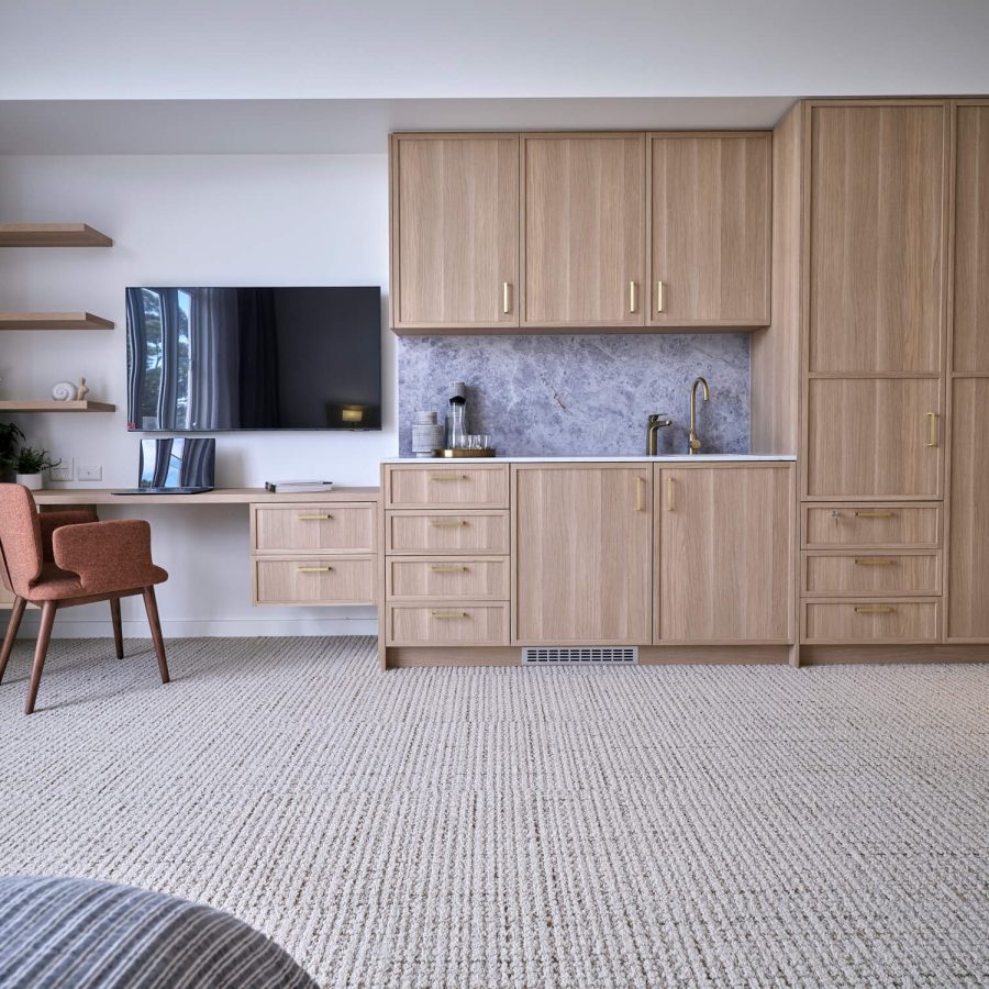 Greenwich Place Superior room desk, television, kitchenette and storage