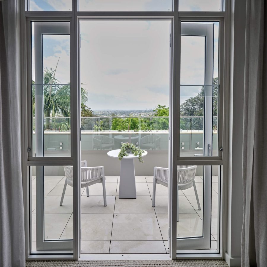 Greenwich Place Superior room looking out to the terrace through open doors
